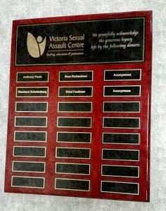 Picture of a donation plaque with the names of some donors on it.